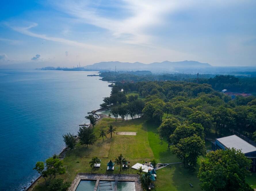 aerial photography of house near body of water